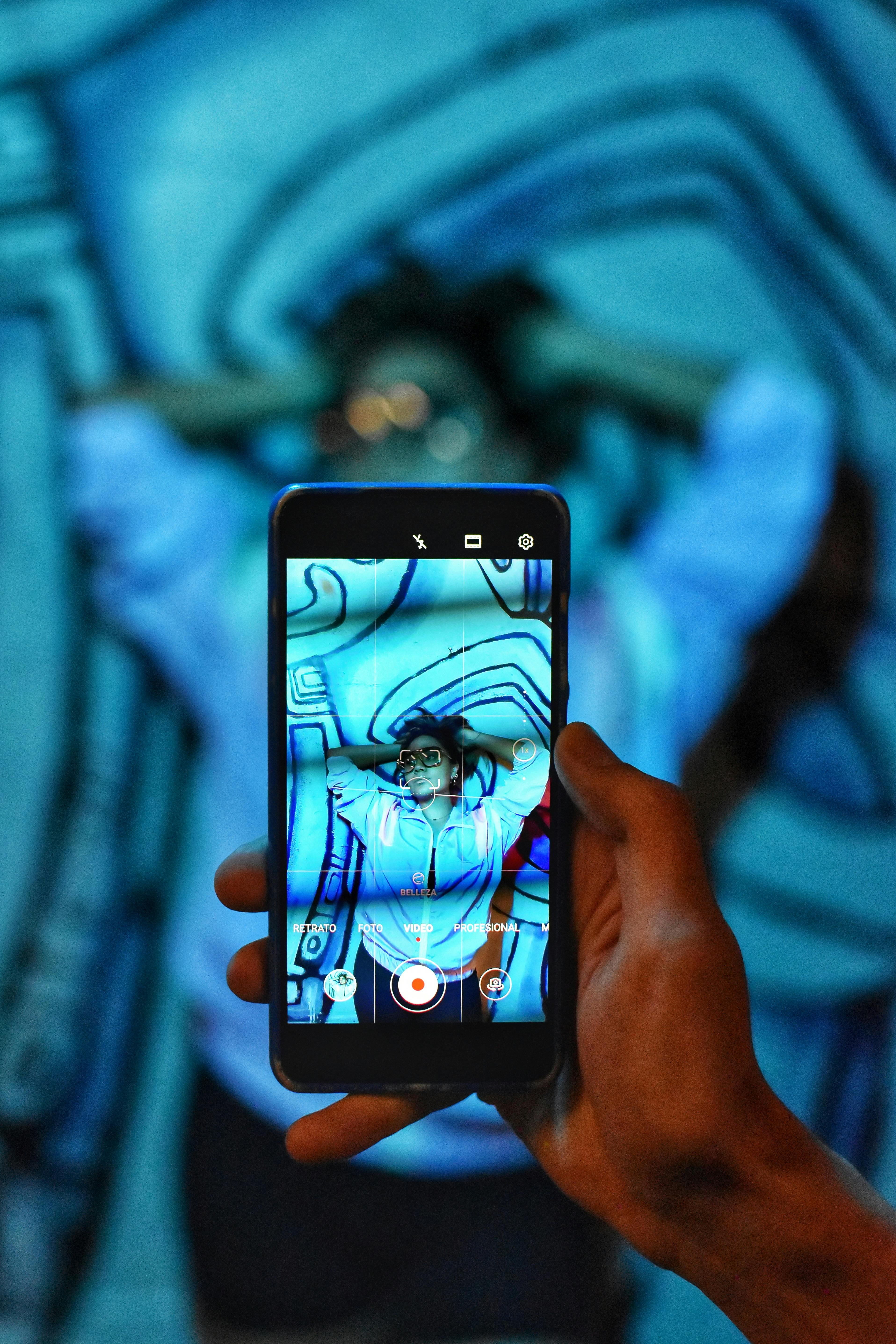 A guest snapping a POV shot at an event